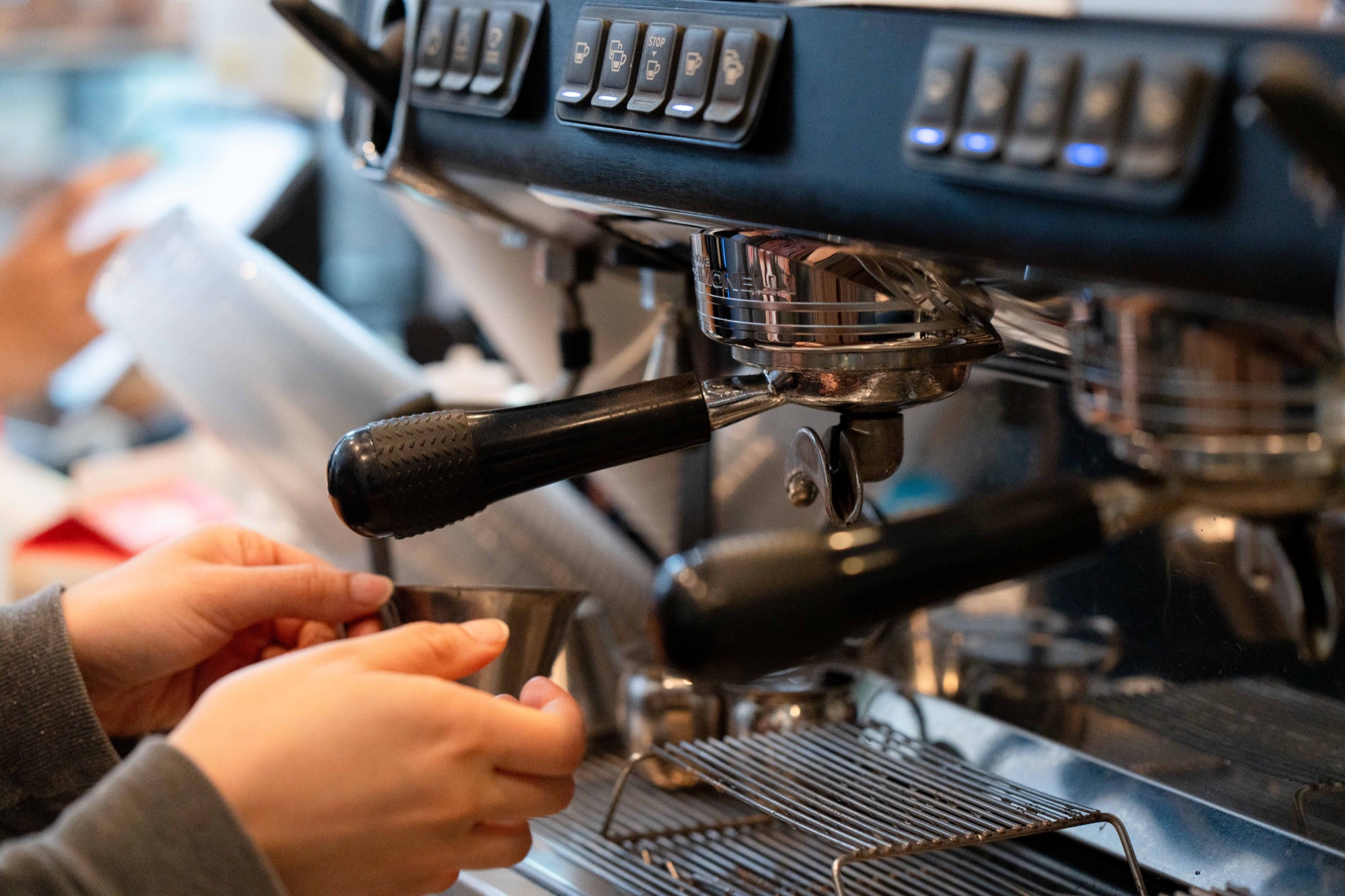 Professional espresso machine and bar setup at Cafe Lafayette